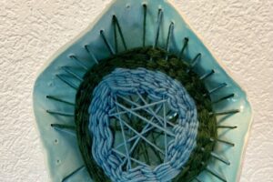 Combining clay with yarn