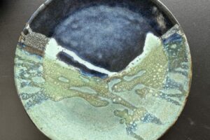 Stoneware plate (glazed black clay)